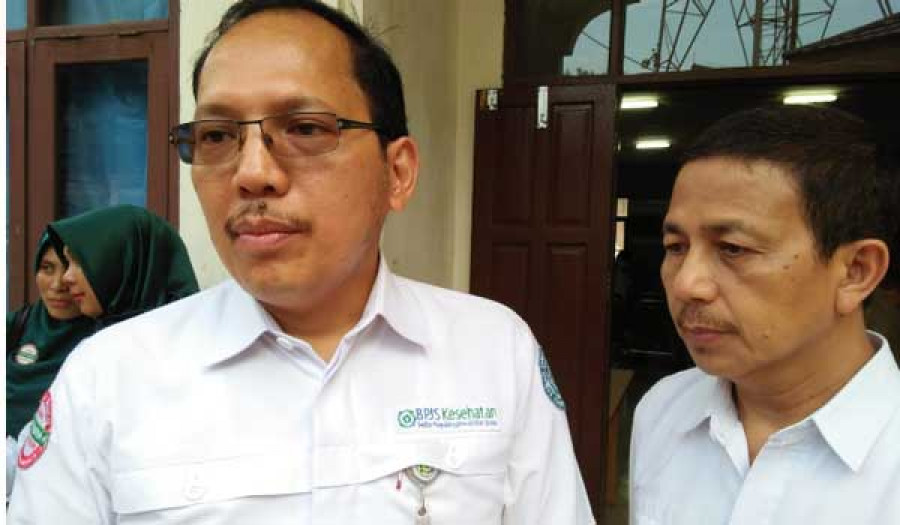 Deputi Direksi Wilayah Kalimantan Benyamin Saut, bersama Kepala BPJS wilayah Samarinda, Nurifansyah