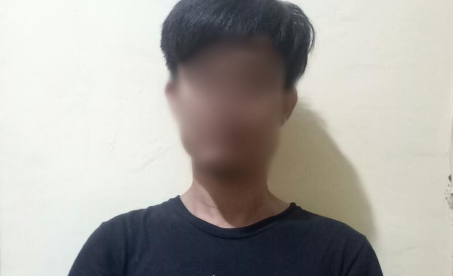 Pelaku saat diamankan di Polsek Kota Bangun. (Foto: Polsek Kota Bangun)