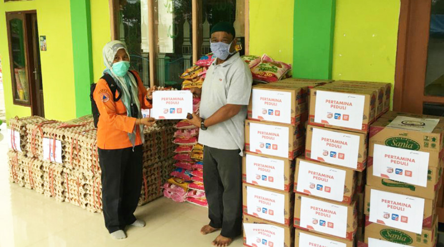 Penyaluran bantuan dari Pertamina RU V Balikpapan untuk korban banjir di Kabupaten Penajam Paser Utara. (Foto: Istimewa/KoranKaltim.Com)