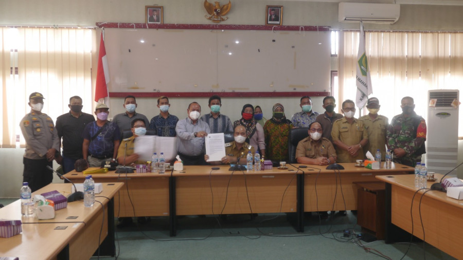 persetujuan para pihak yang diteken dalam berita acara penyelesaian sengketa jembatan sungai ratah (yosafat/korankaltim.com)