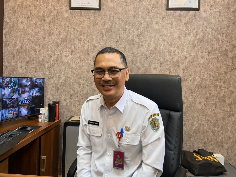 Plt Kepala Dispora Kaltim, Muhammad Faisal, saat ditemui di ruangannya.(Ainur/Korankaltim.com)