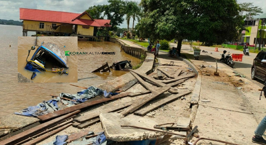 Truk Fuso yang nampak hanya bagian depan pasca terjun bebas ke sungai Mahakam dini hari tadi. (Foto: Reza Fahlevi/Korankaltim.com)