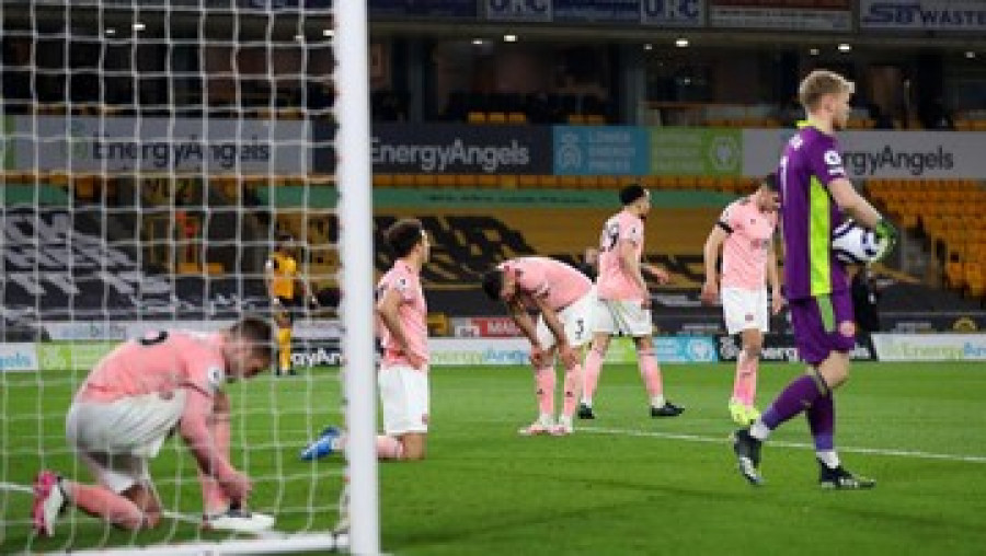 Sheffield United kalah dari Wolverhampton dan dipastikan degradasi dari Premier League. (Foto: Pool via REUTERS/CATHERINE IVILL)
