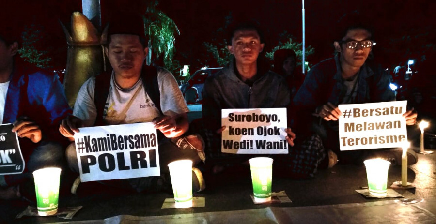 Aksi solidaritas yang dilaksanakan di Balikpapan Minggu (13/5) malam