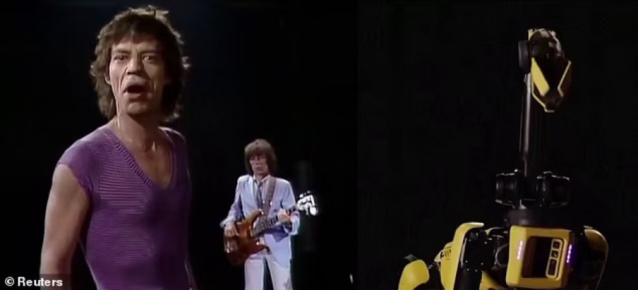 Robot buatan Boston Dynamic (kanan) yang mampu menirukan gerakan Mick Jagger. (dailymail.co.uk)